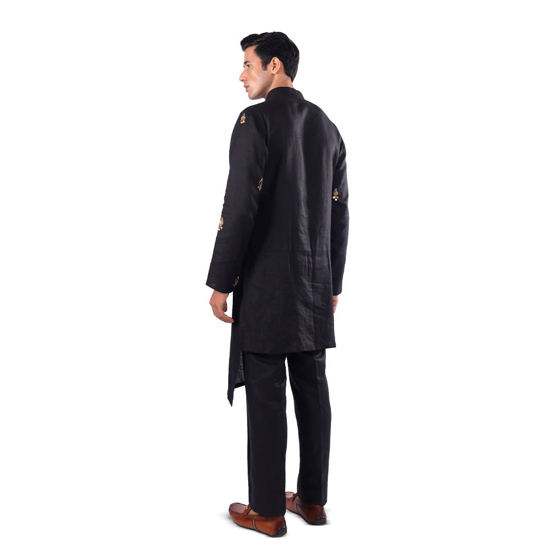 Midnight Black Monochrome Hemp Kurta Set, back view showing the asymmetric hem