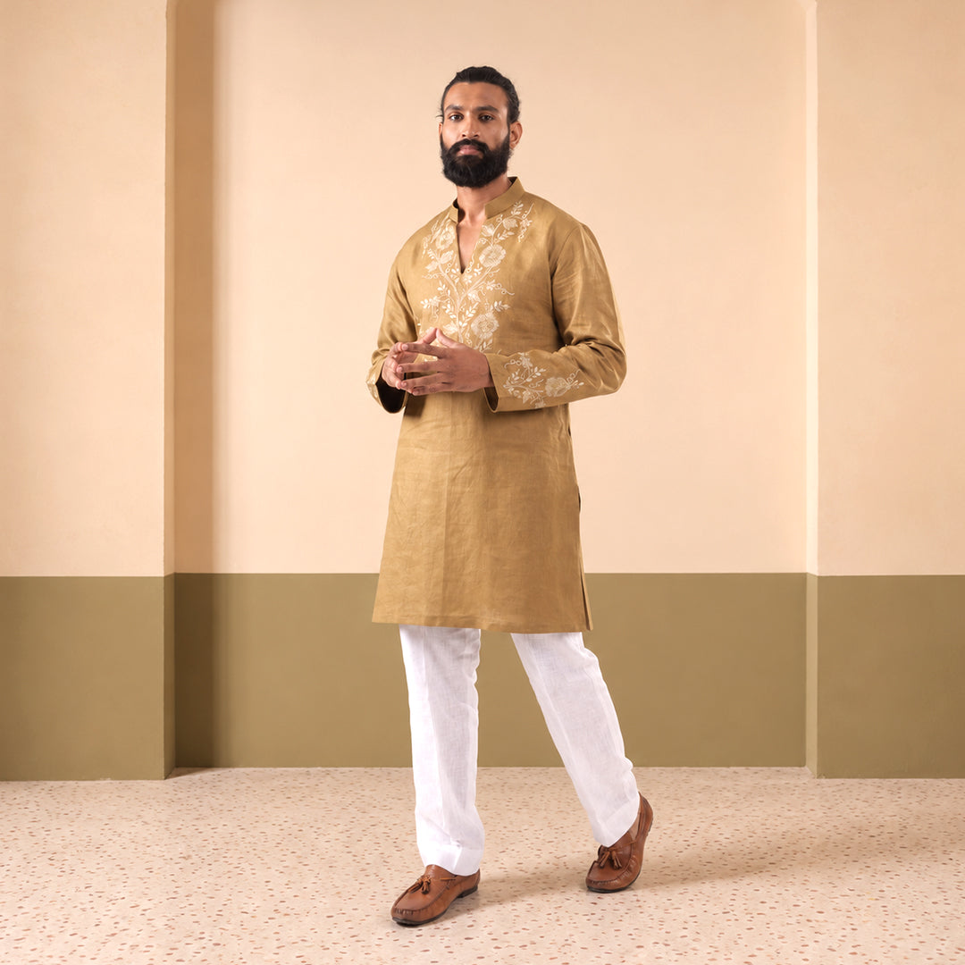 Olive Gold Vine-Embroidered Hemp Kurta Set, model standing in a room with olive-green walls