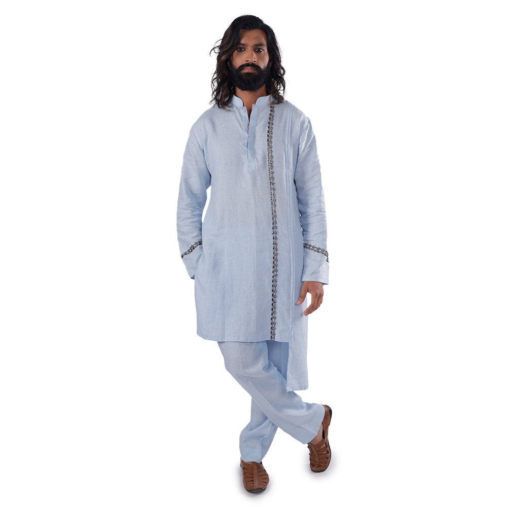 Sky Blue Asymmetric-Trim Linen Kurta Set, three-quarter front view walking, on white background
