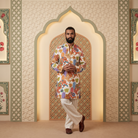 Floral printed kurta with white trousers