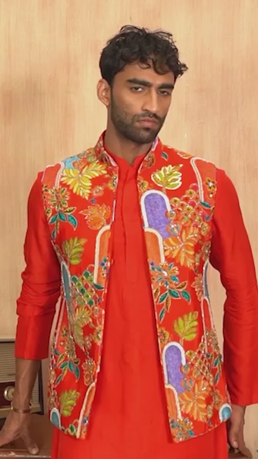 Khyenn — model in a red hand-embellished kurta with a botanical print